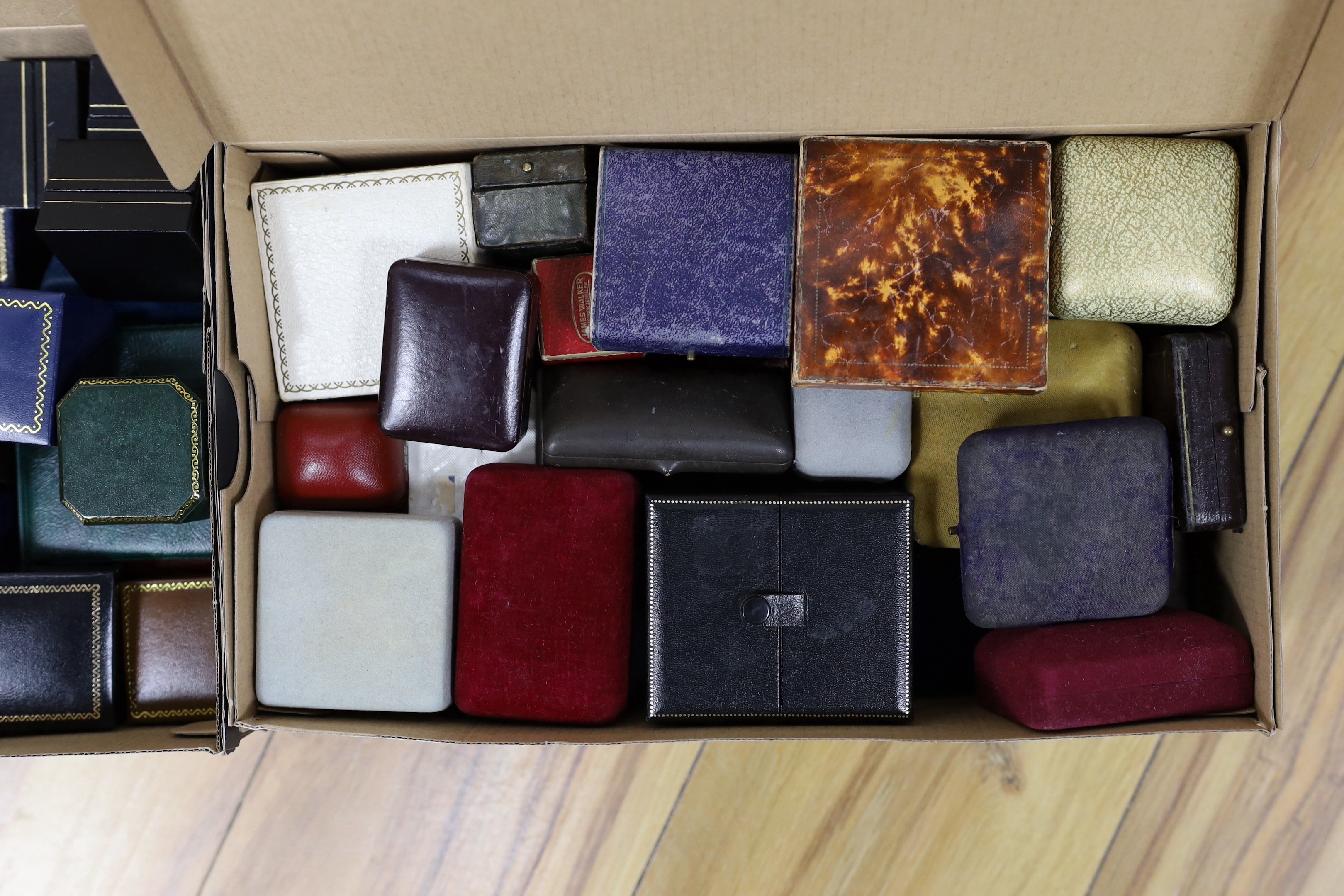 A large quantity of assorted empty jewellery boxes.